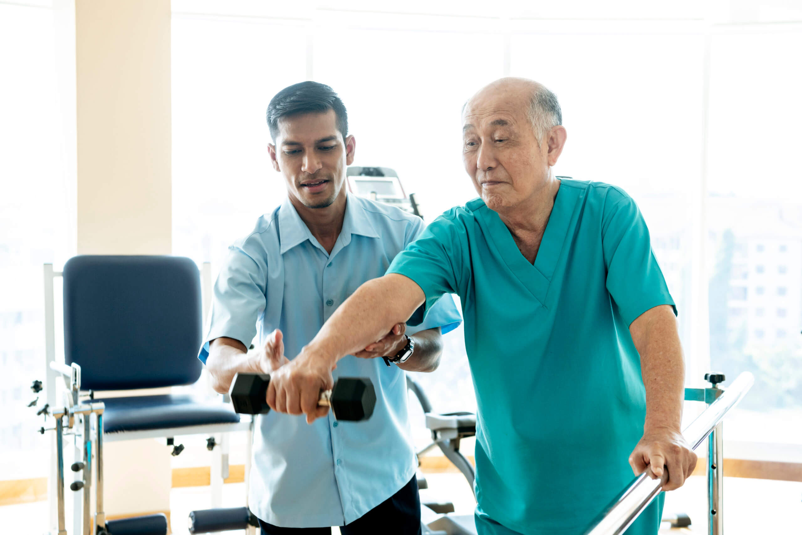 Therapist Helping Patient During A Rehab Session